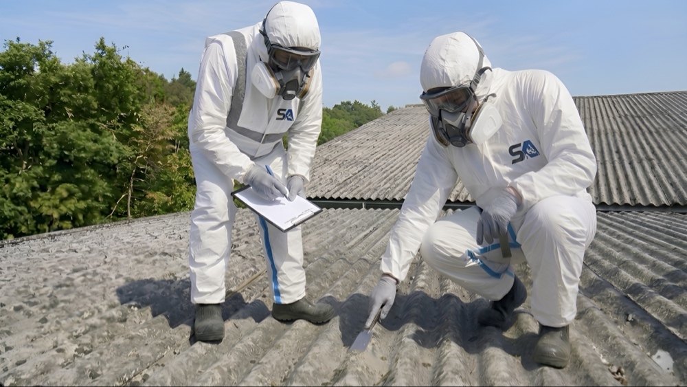 Surrey Asbestos team removing asbestos garage roof in Guildford