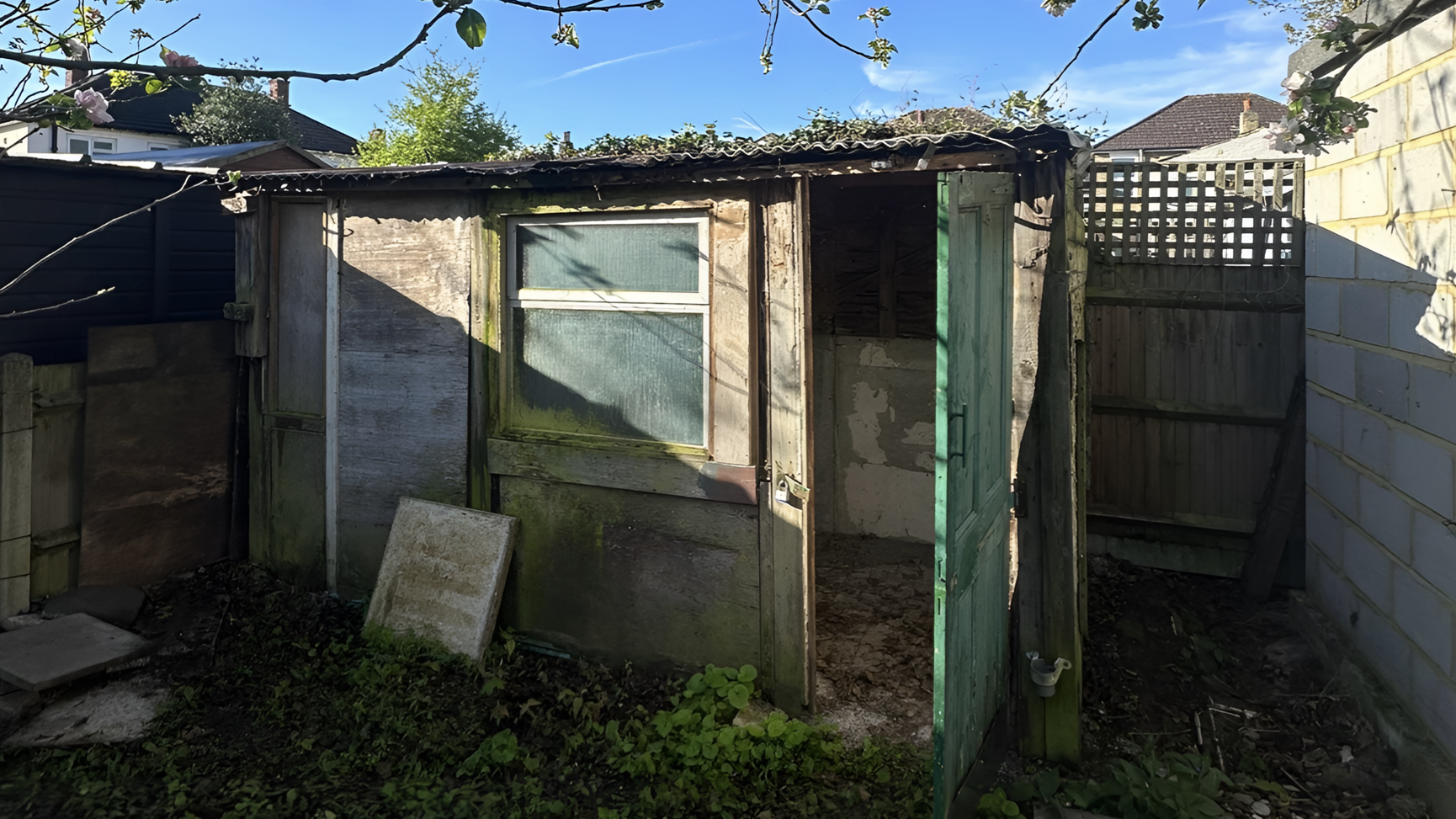 Shed roof before asbestos removal